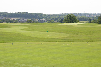 A wide shot of the greens in the practice area